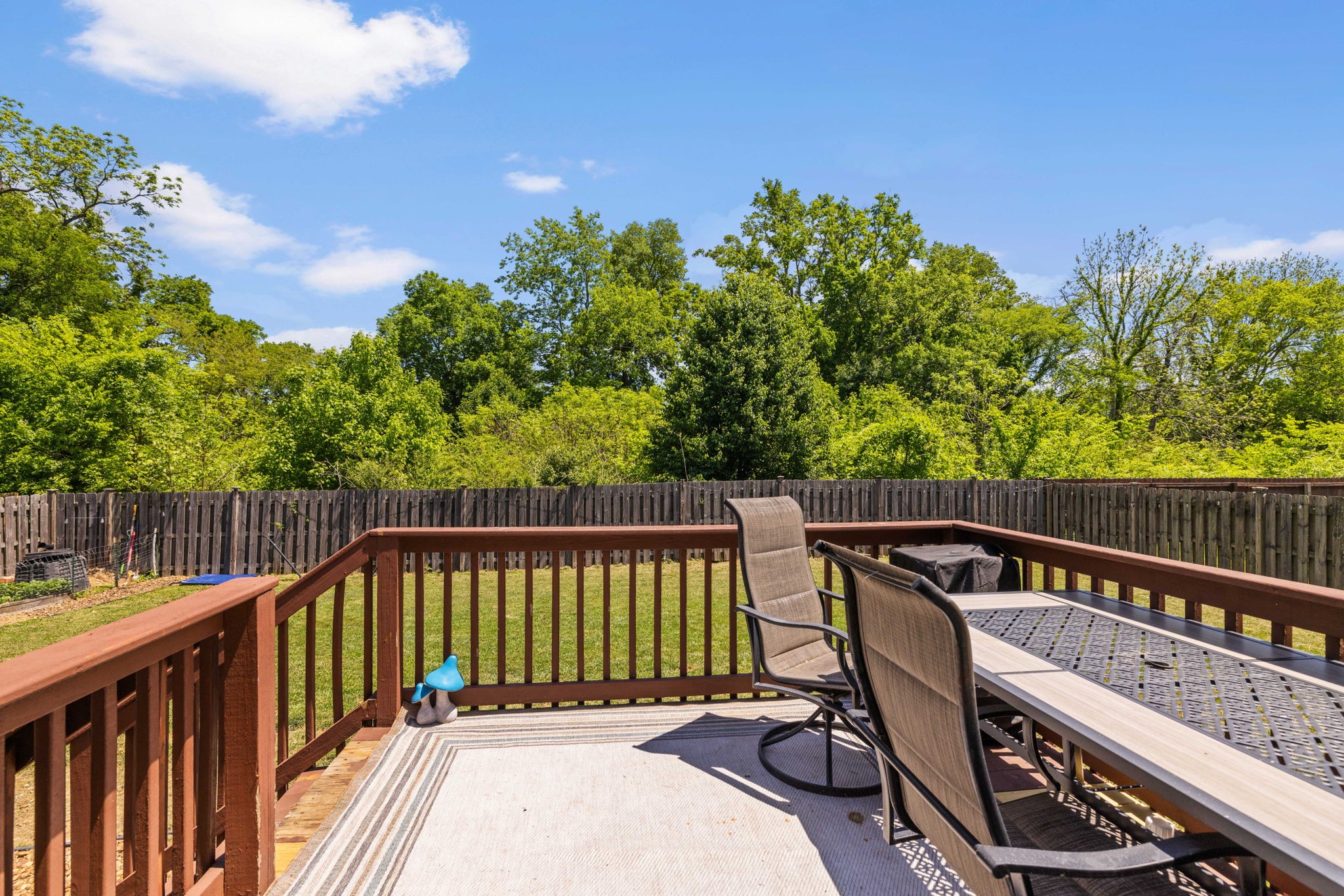 1154 Wrights Mill Road Spring Hill, TN 37174 - Photo 4 of 38 a view of a roof deck with wooden fence and floor