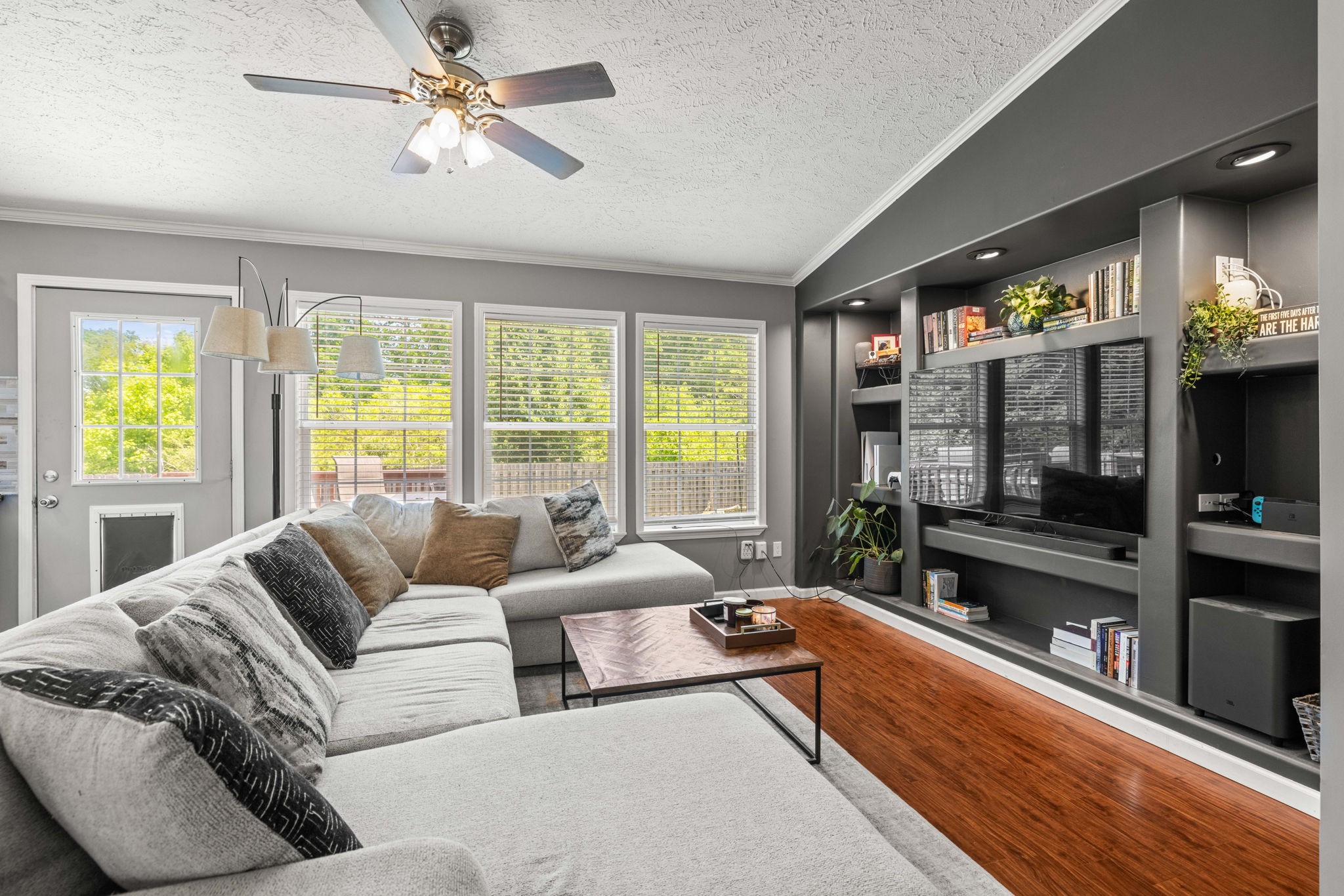 1154 Wrights Mill Road Spring Hill, TN 37174 - Photo 10 of 38 a living room with furniture large window and a flat screen tv