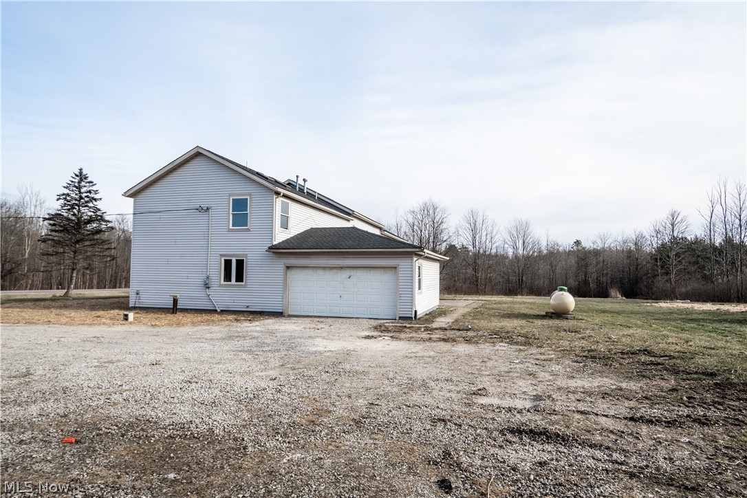 6908 State Rte 322 Windsor, OH 44099 - Photo 5 of 35 Attached garage & plenty of parking.