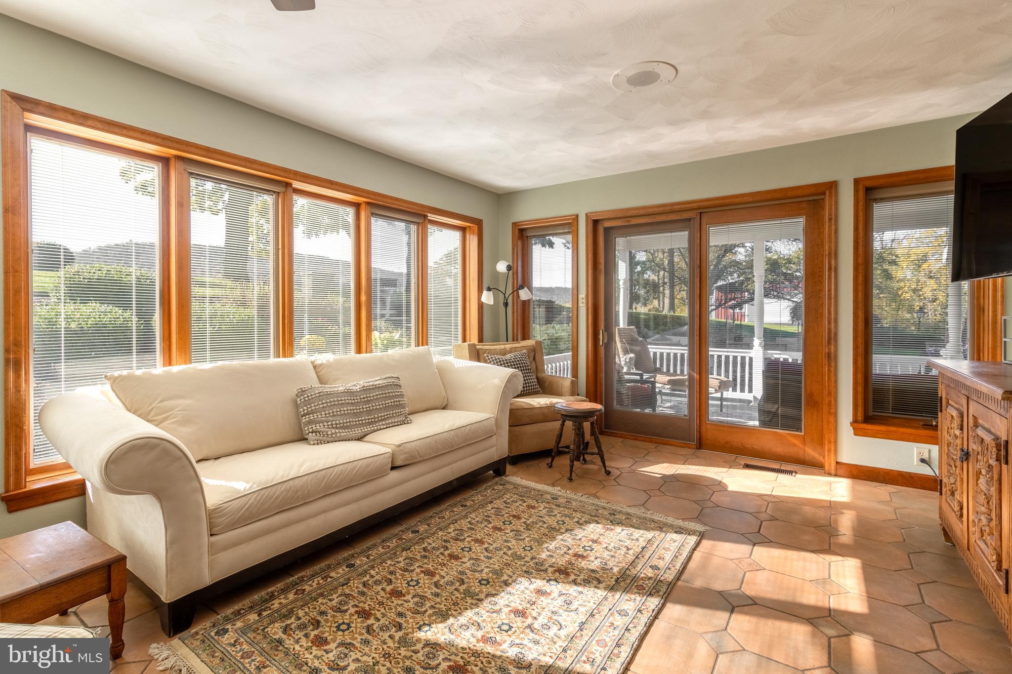 261 Old Fort Road Spring Mills, PA 16875 - Photo 16 of 54 a living room with furniture and a large window