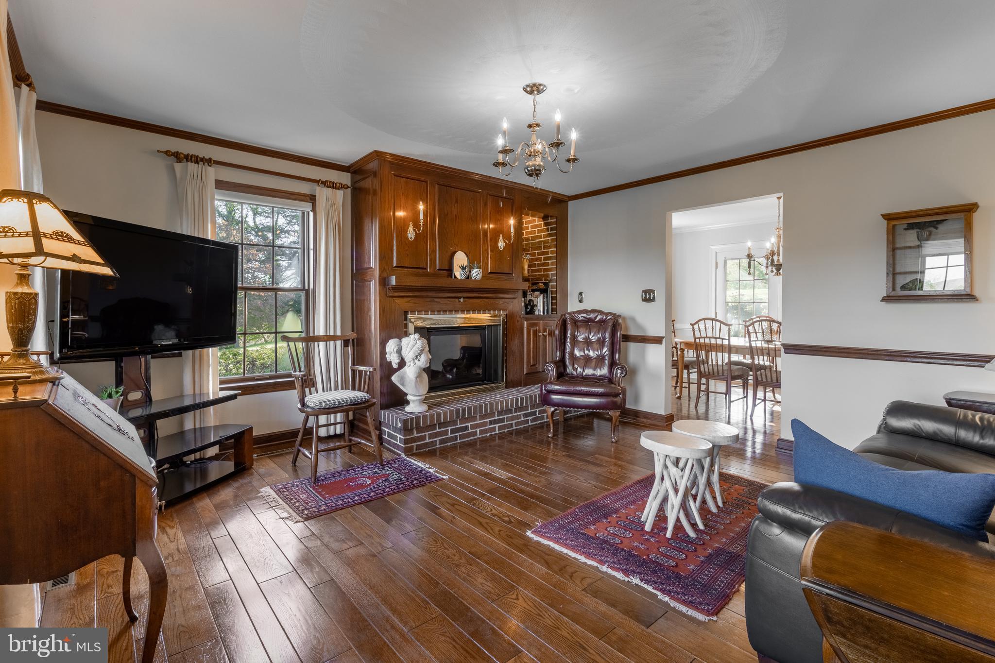 261 Old Fort Road Spring Mills, PA 16875 - Photo 19 of 54 a living room with furniture a flat screen tv and a fireplace