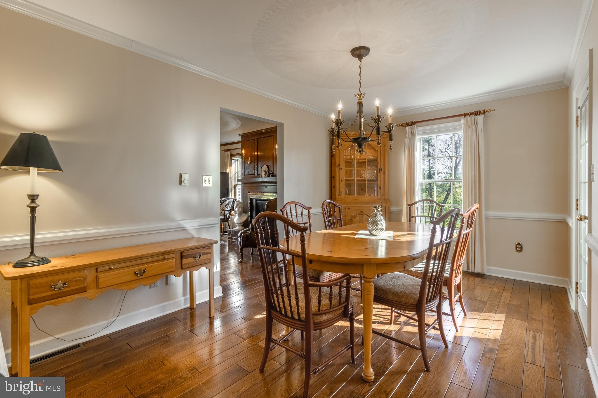 261 Old Fort Road Spring Mills, PA 16875 - Photo 21 of 54 a view of a dining room with furniture window and wooden floor