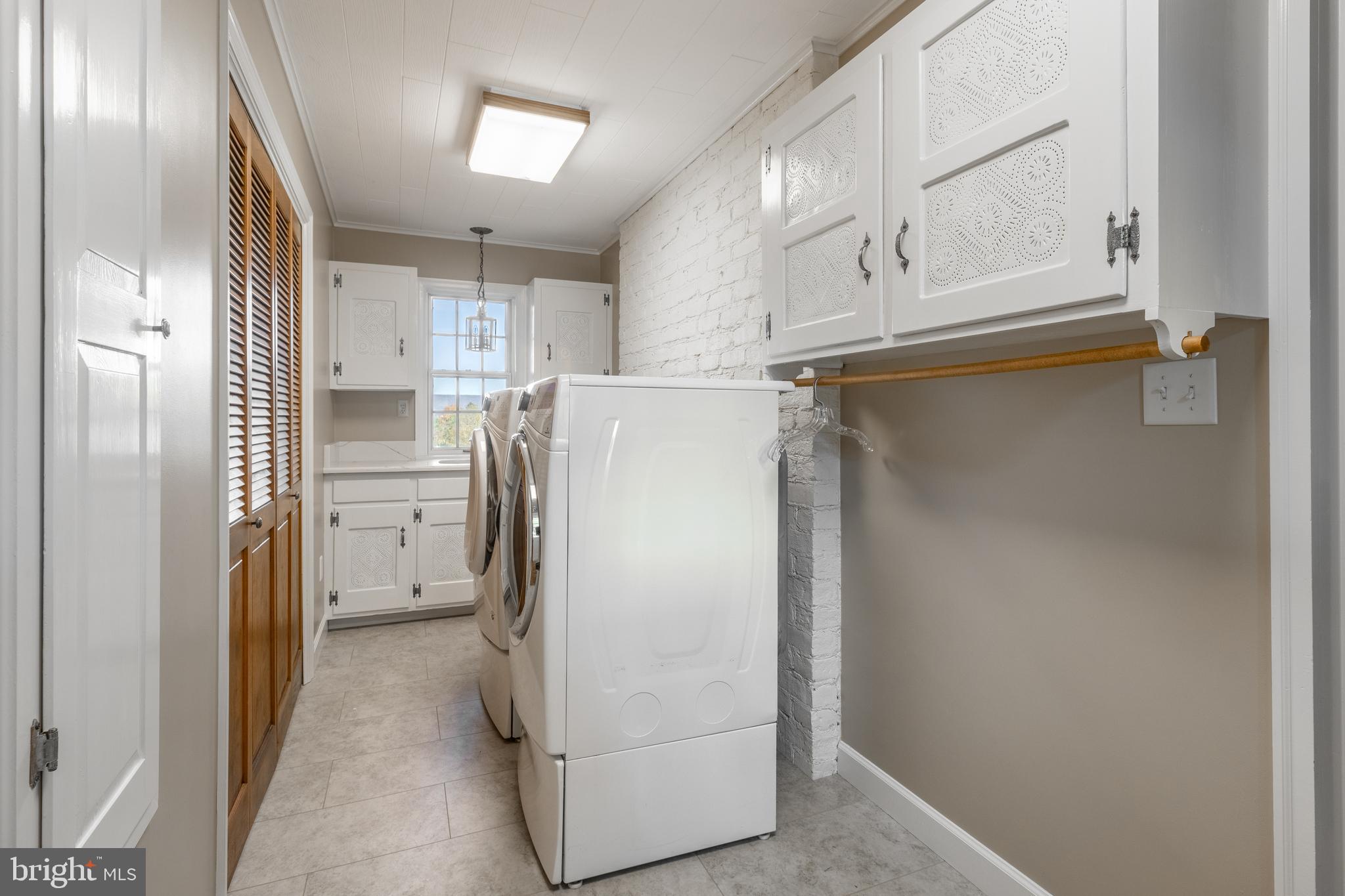 261 Old Fort Road Spring Mills, PA 16875 - Photo 23 of 54 a white refrigerator freezer sitting inside of a kitchen