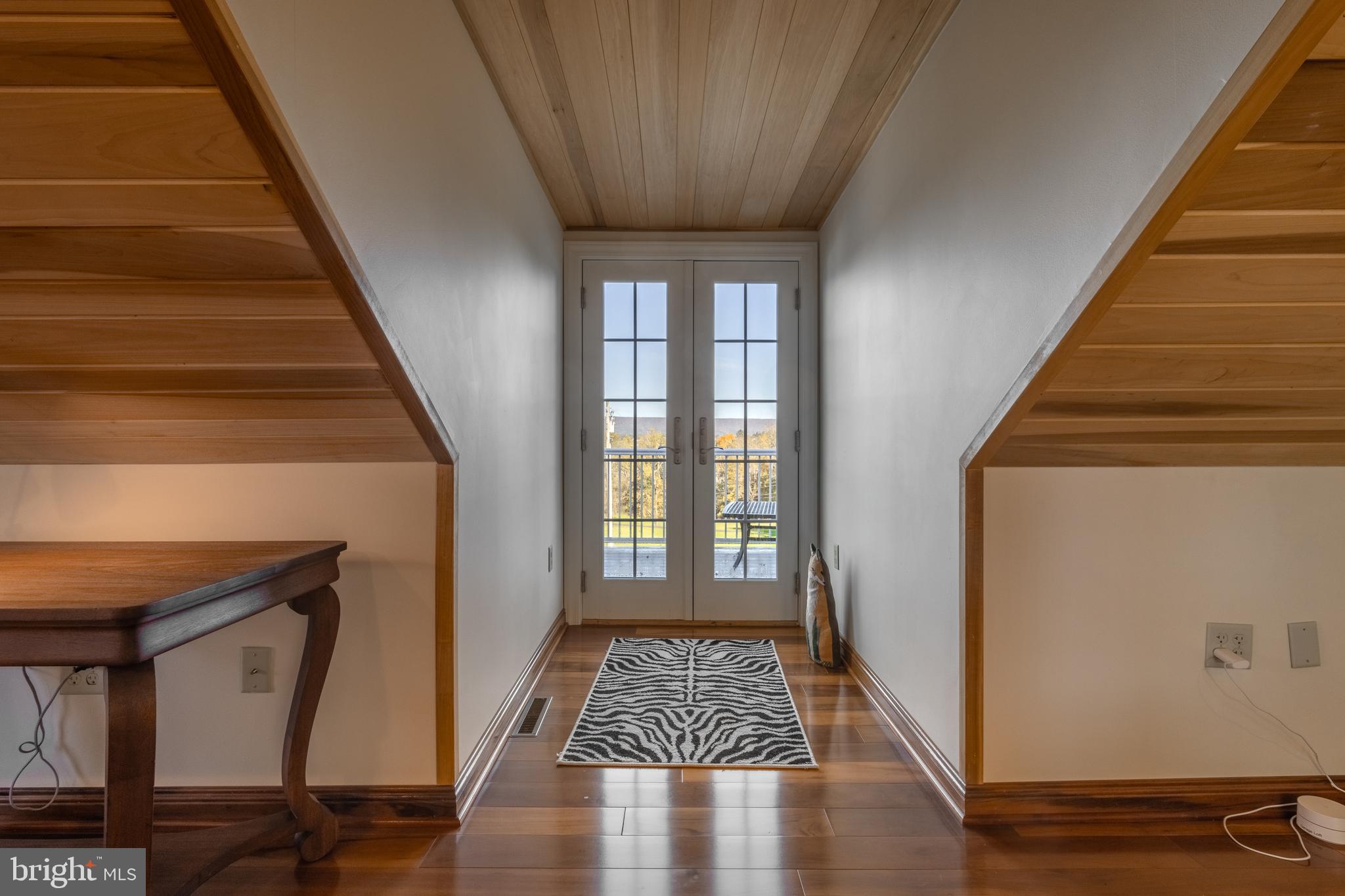 261 Old Fort Road Spring Mills, PA 16875 - Photo 34 of 54 a view of an entryway with wooden floor