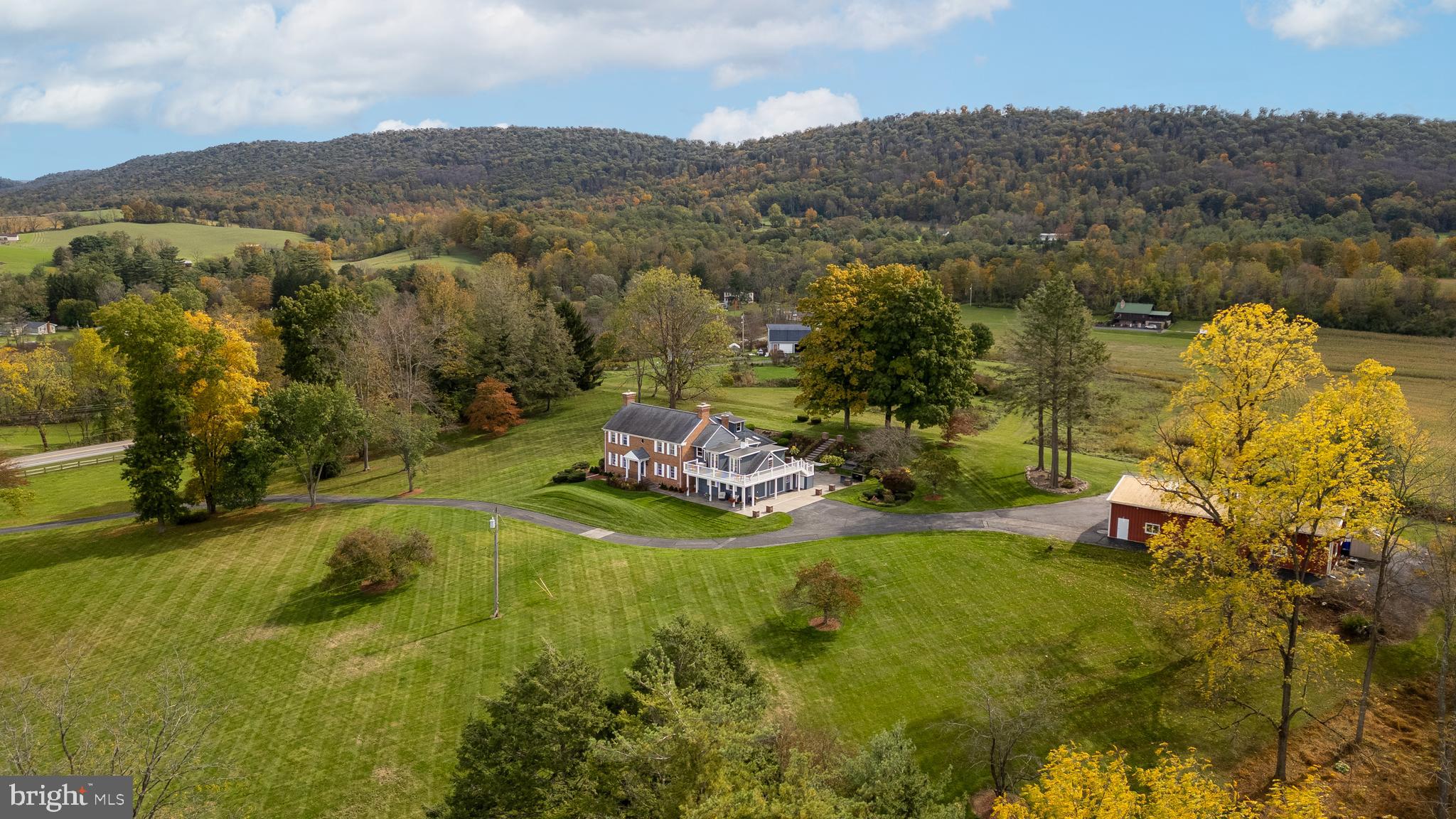 261 Old Fort Road Spring Mills, PA 16875 - Photo 4 of 54 an aerial view of residential houses with outdoor space and trees