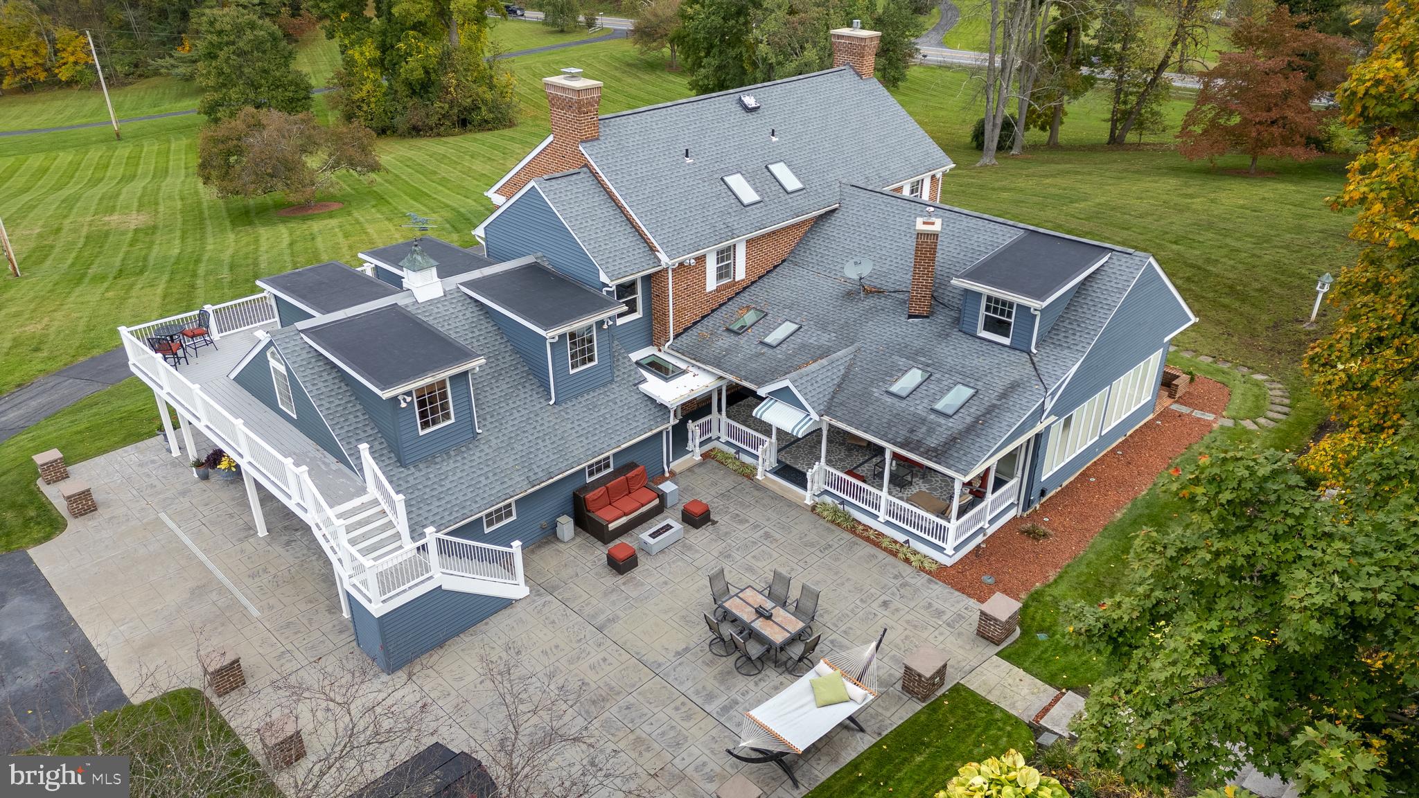 261 Old Fort Road Spring Mills, PA 16875 - Photo 43 of 54 an aerial view of a house with a garden