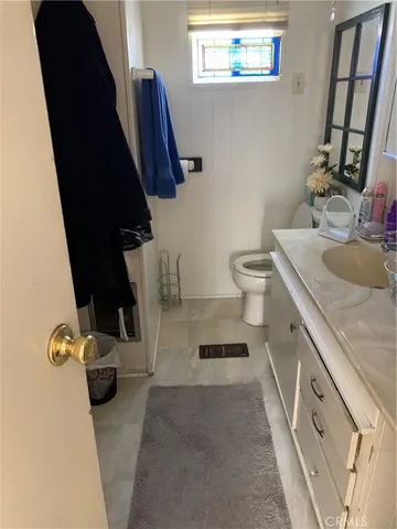 a bathroom with a sink and a toilet