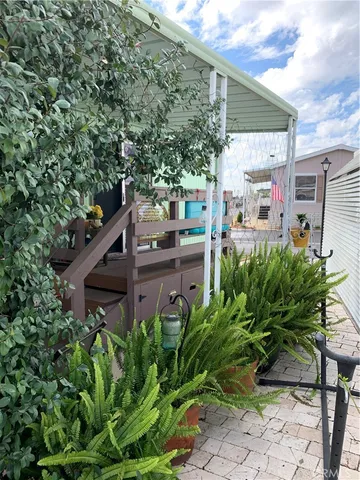 a view of a chairs in a backyard