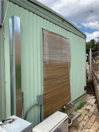 a bathroom with sink toilet and shower