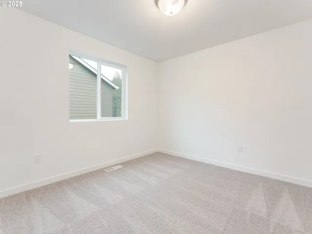 a bathroom with a double vanity sink toilet and a tub