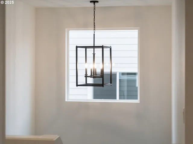 a view of a balcony with wooden floor