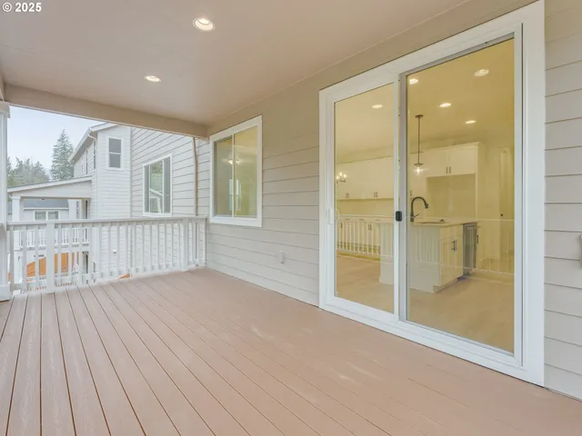 a dining room with furniture and a window