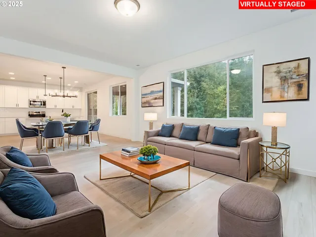 a bedroom with bed and a potted plant
