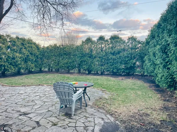 a view of backyard with slide