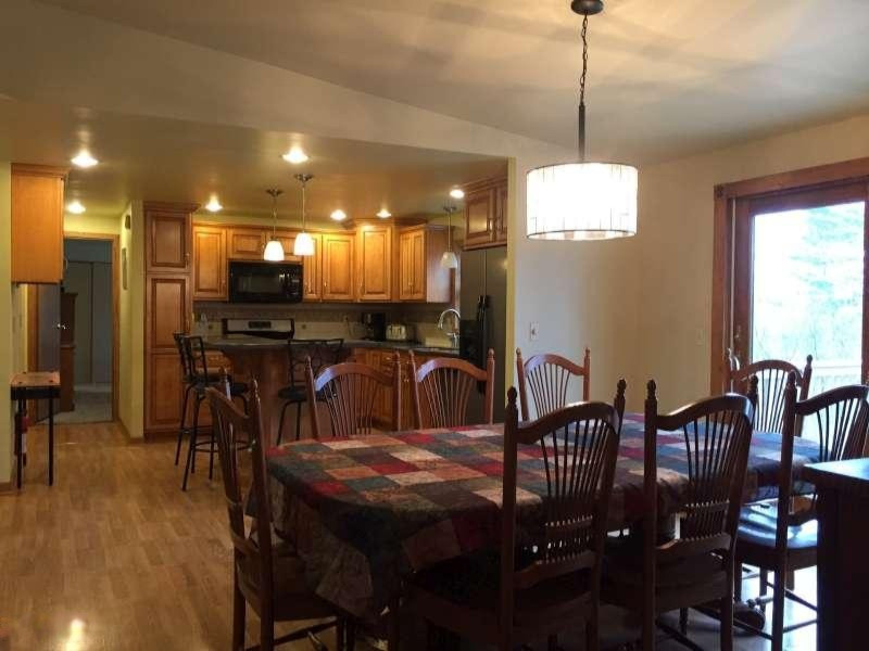 148 North Gordon Road Scottville, MI 49454 - Photo 9 of 29 Dining, Kitchen beyond