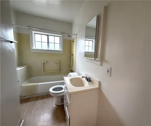 a bathroom with a sink toilet and a bathtub