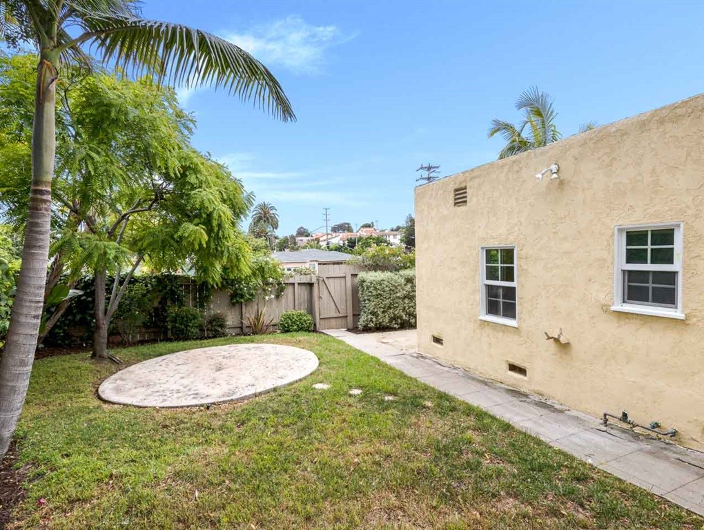 1980 Chatsworth Boulevard San Diego, CA 92107 - Photo 18 of 21 a view of a house with a backyard