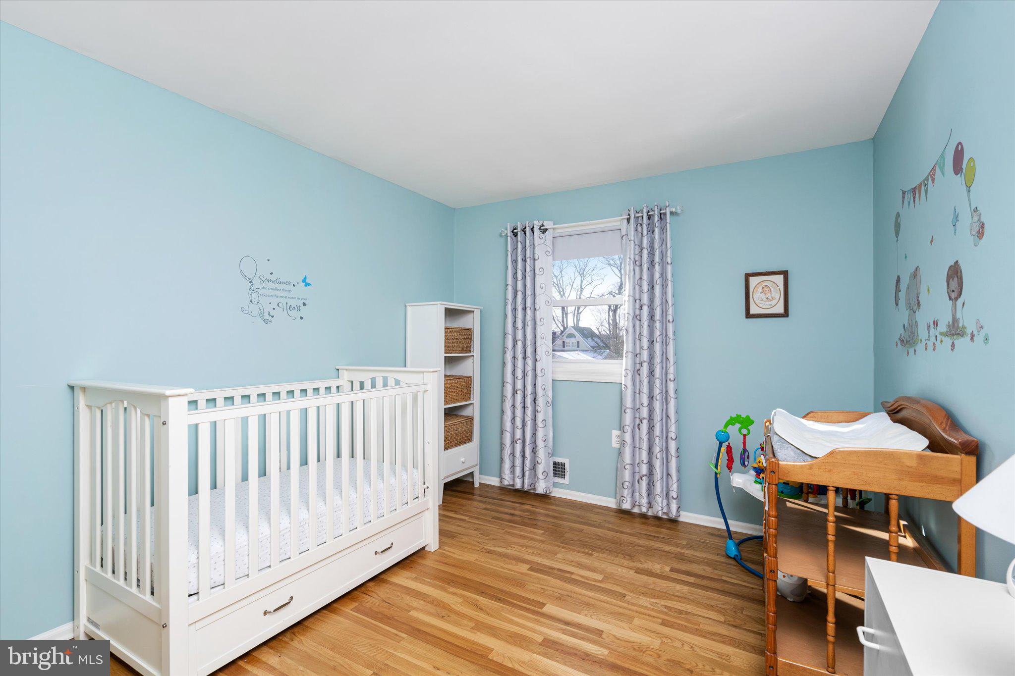 8 Wayne Way East Windsor, NJ 08520 - Photo 17 of 29 a view of a bedroom with furniture and wooden floor