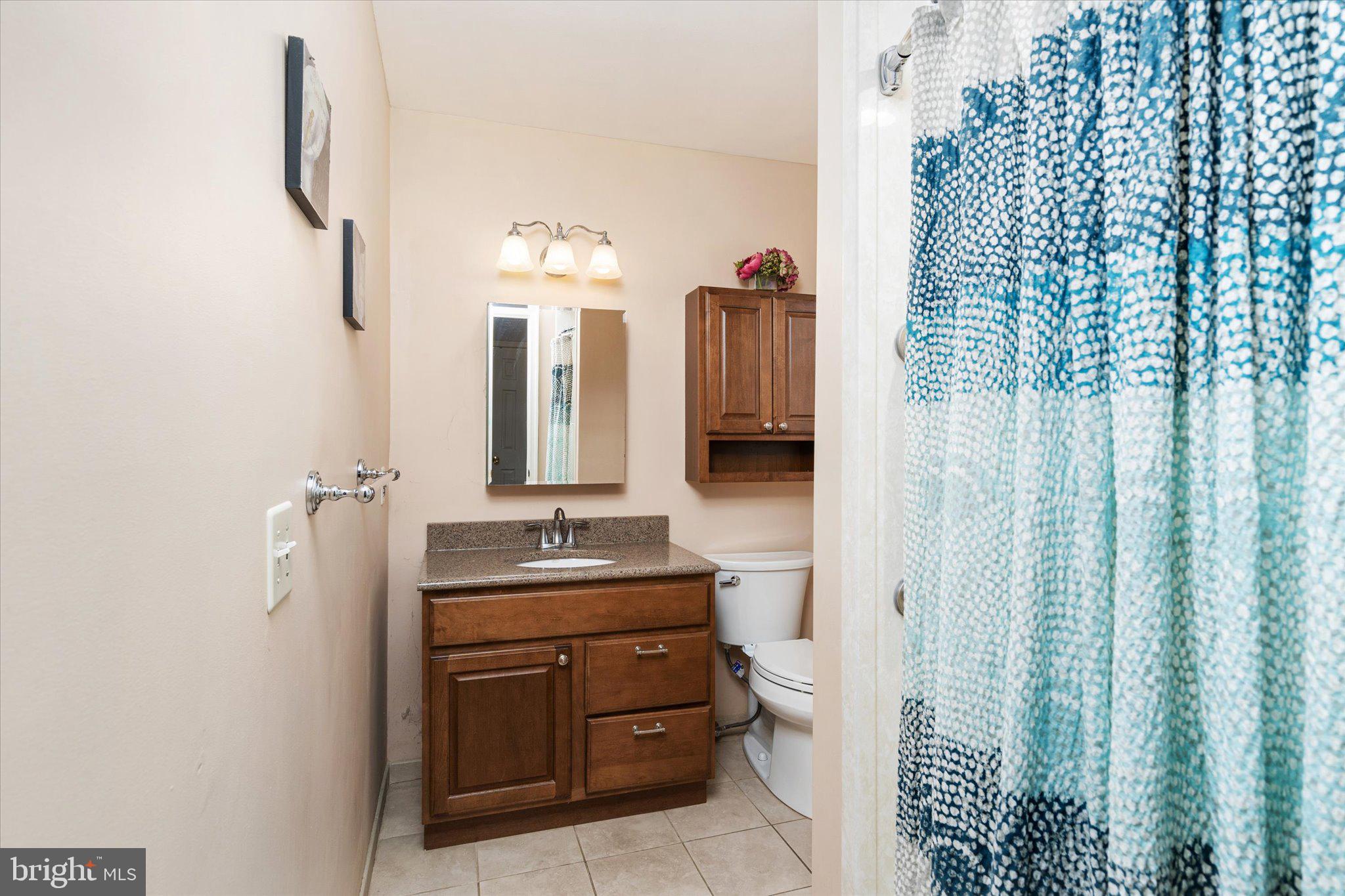 8 Wayne Way East Windsor, NJ 08520 - Photo 25 of 29 a bathroom with a double vanity sink and mirror