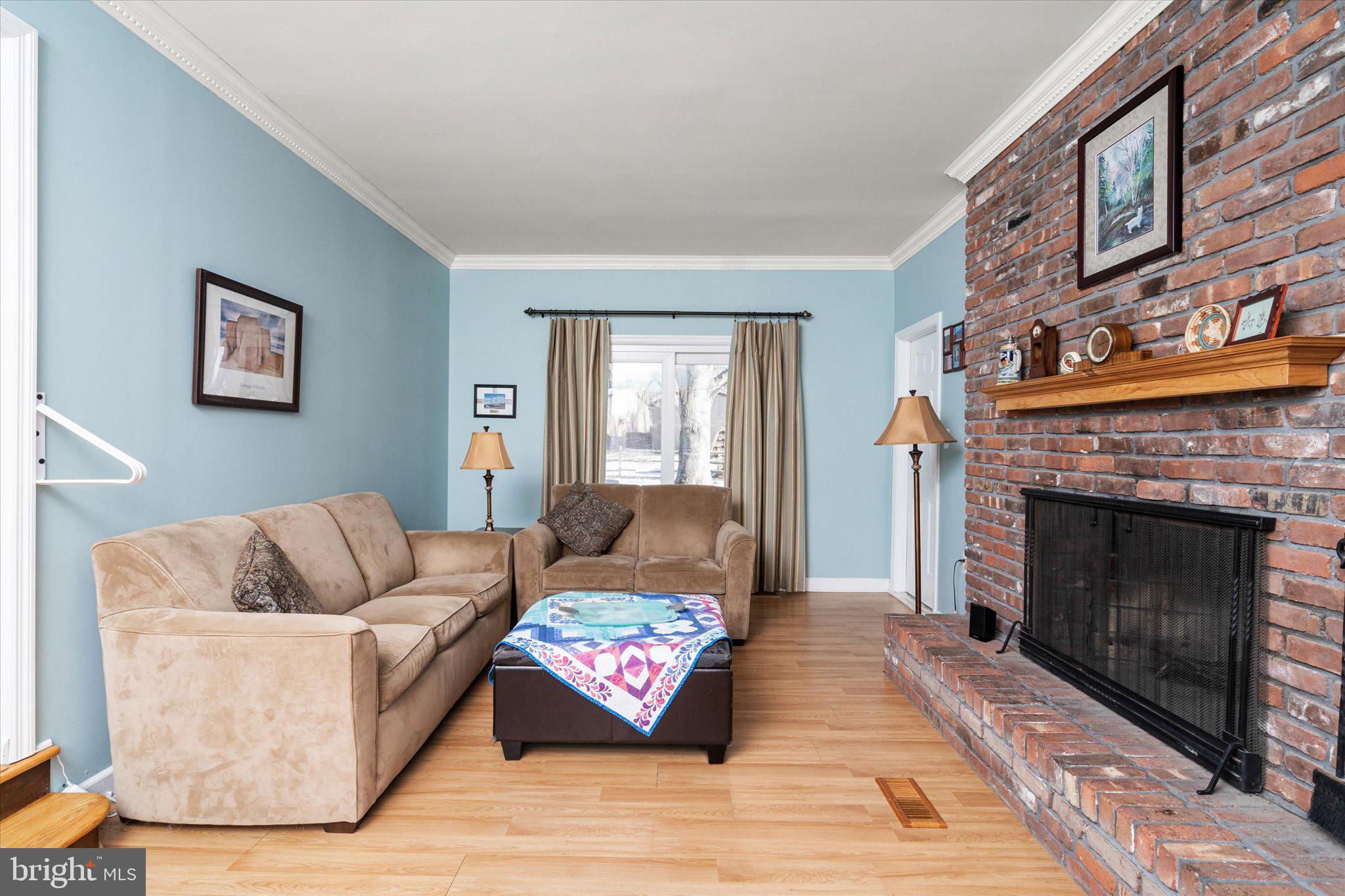 8 Wayne Way East Windsor, NJ 08520 - Photo 6 of 29 a living room with furniture and a fireplace