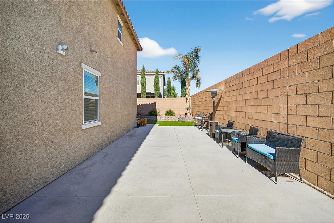 9164 Verdugo Ridge Court Las Vegas, NV 89148 - Photo 28 of 31 Paved side yard