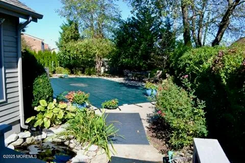 a bunch of flowers are in a garden