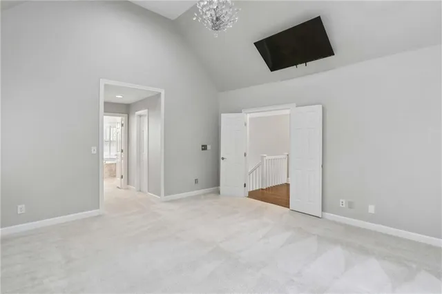 a view of an empty room with a flat screen tv