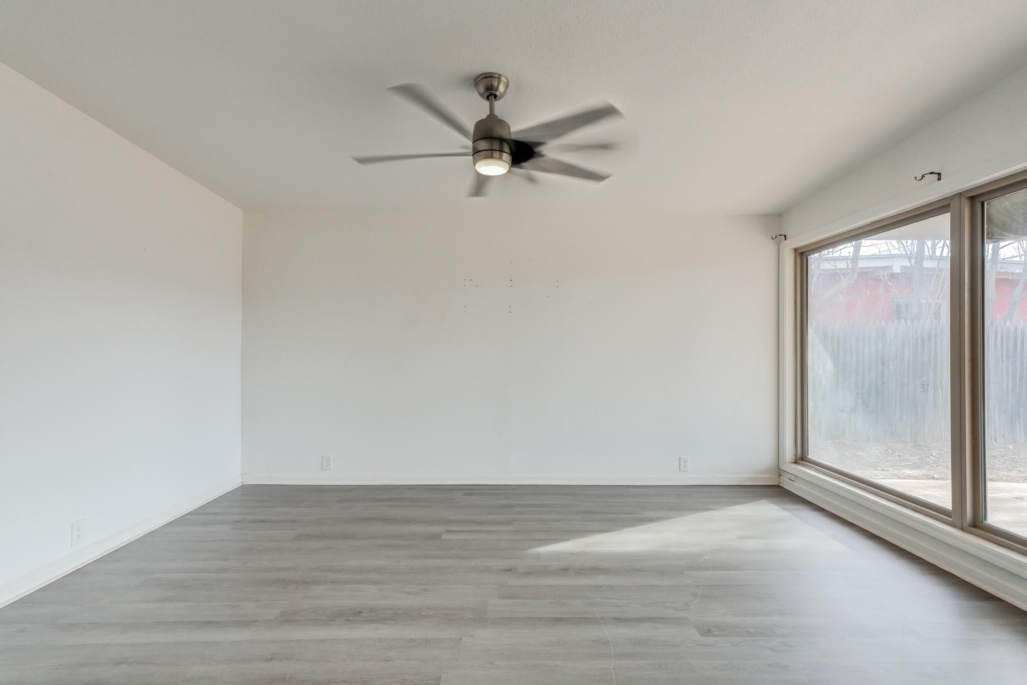 2803 66th Street Lubbock, TX 79413 - Photo 12 of 23 a view of an empty room with a window
