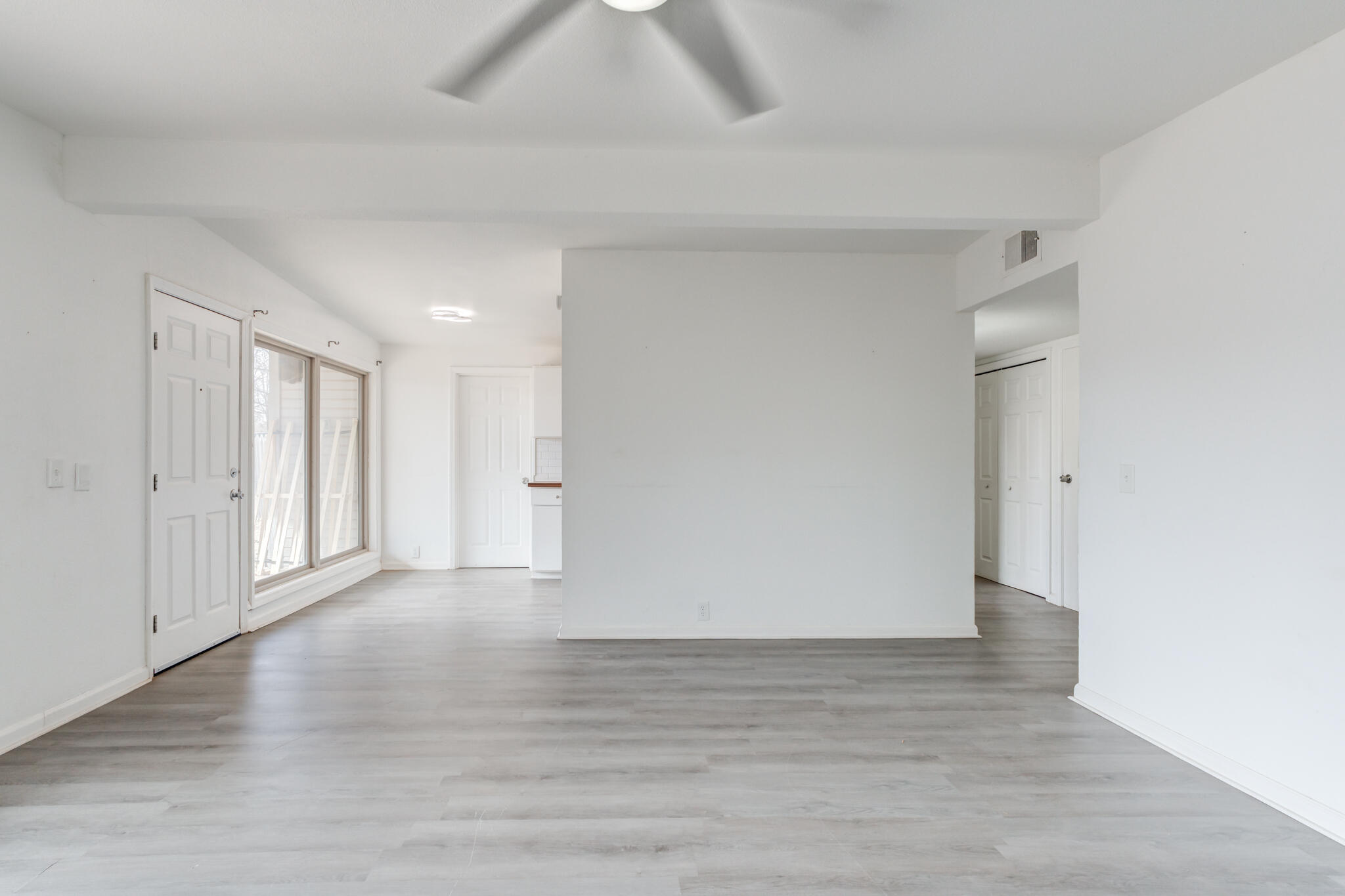 2803 66th Street Lubbock, TX 79413 - Photo 14 of 23 a view of an empty room and wooden floor