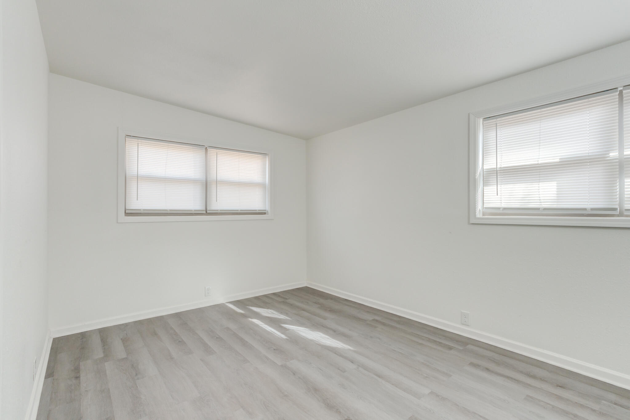 2803 66th Street Lubbock, TX 79413 - Photo 19 of 23 an empty room with a window
