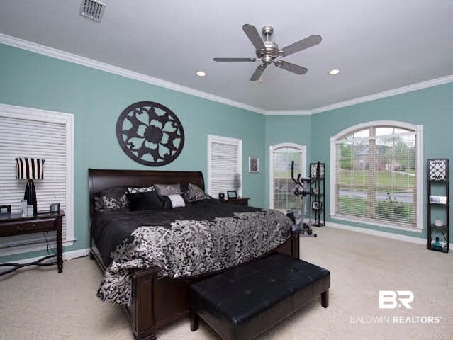 7814 Balin Drive Daphne, AL 36527 - Photo 12 of 26 Spacious, downstairs Master Suite with plenty of natural light, his/ hers walk-in closets, and a glamour bath that gives everyone their own space!