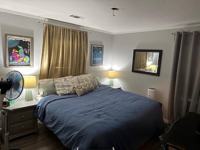 4631 Monaco Road Memphis, TN 38117 - Photo 8 of 15 a bedroom with a bed and painting on the wall