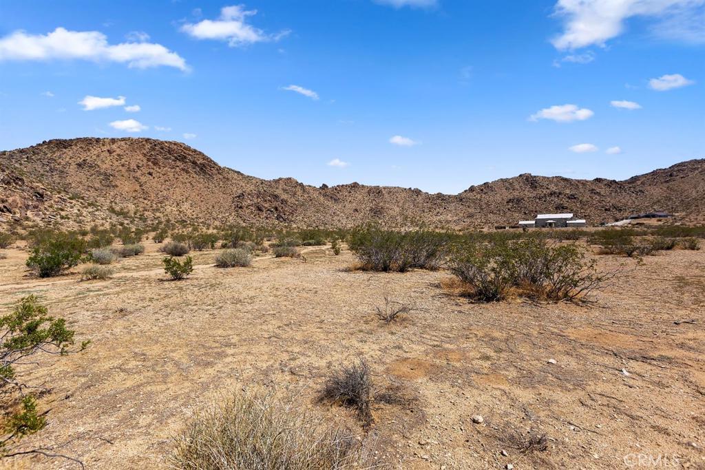 0 Clark Drive Apple Valley, CA 92307 - Photo 8 of 14 a view of a mountain view of mountains and sunset