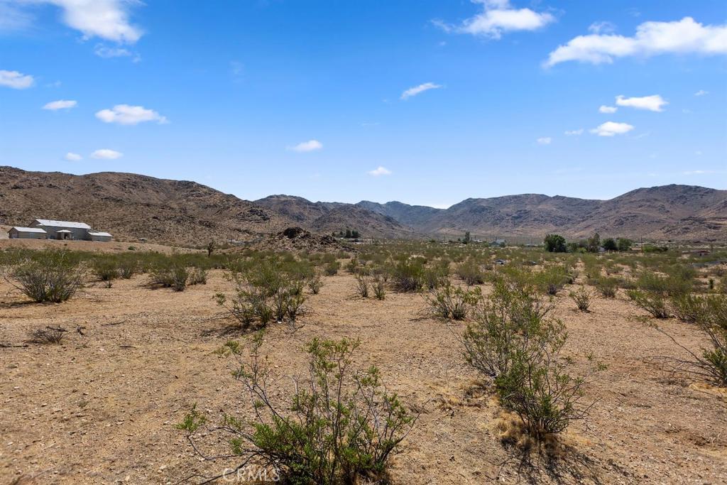0 Clark Drive Apple Valley, CA 92307 - Photo 9 of 14 a view of a lake with mountains in the background