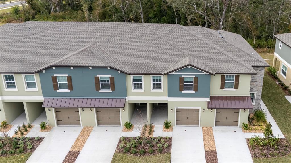 11091 Wishing Cloud Road Land O Lakes, FL 34638 - Photo 22 of 25 a aerial view of a house