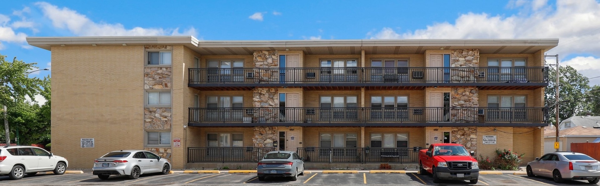 11907 Gregory Street, Unit 3 Blue Island, IL 60406 - Photo 1 of 17 a car parked in front of a building