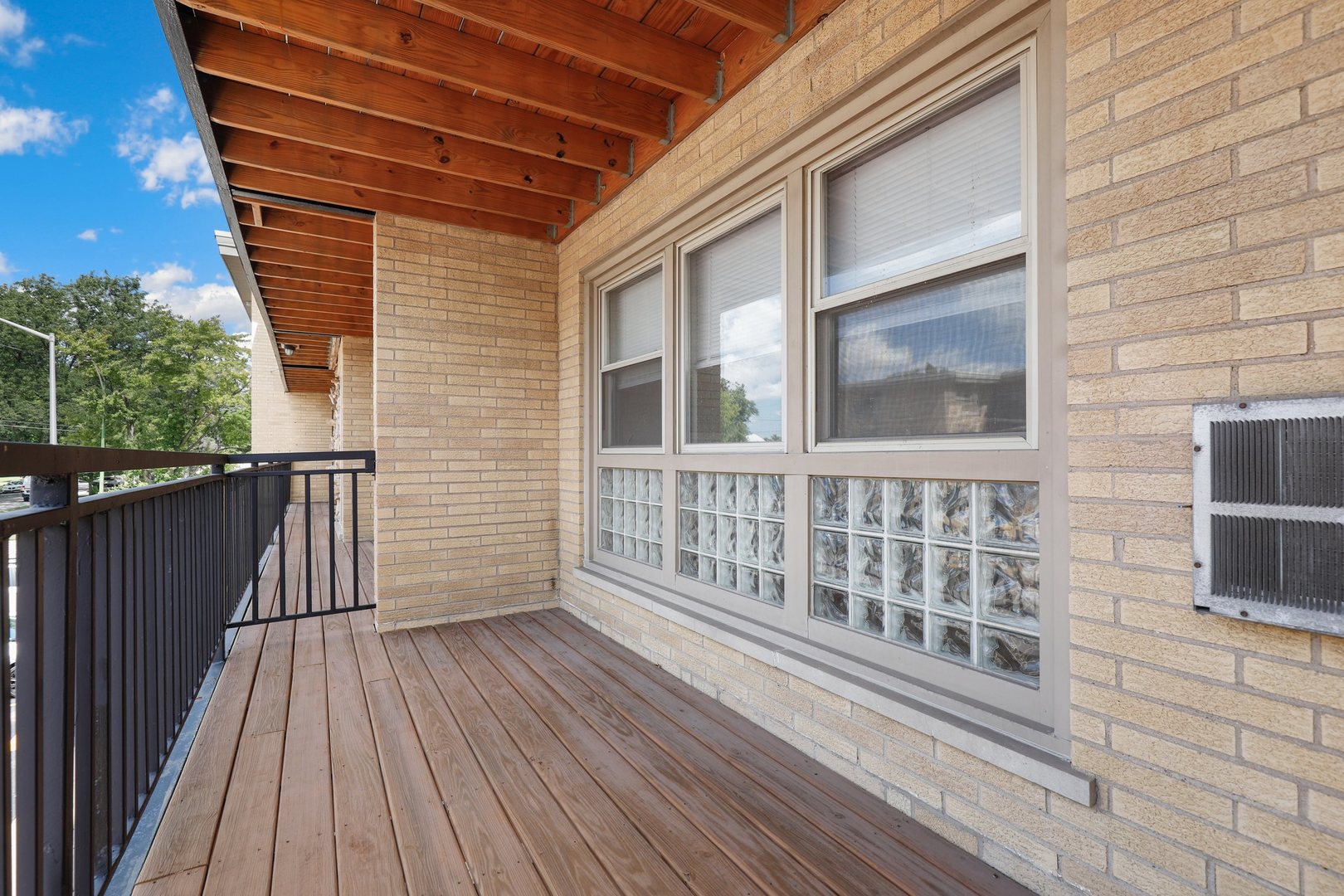 11907 Gregory Street, Unit 3 Blue Island, IL 60406 - Photo 11 of 17 a view of a brick house with wooden floor