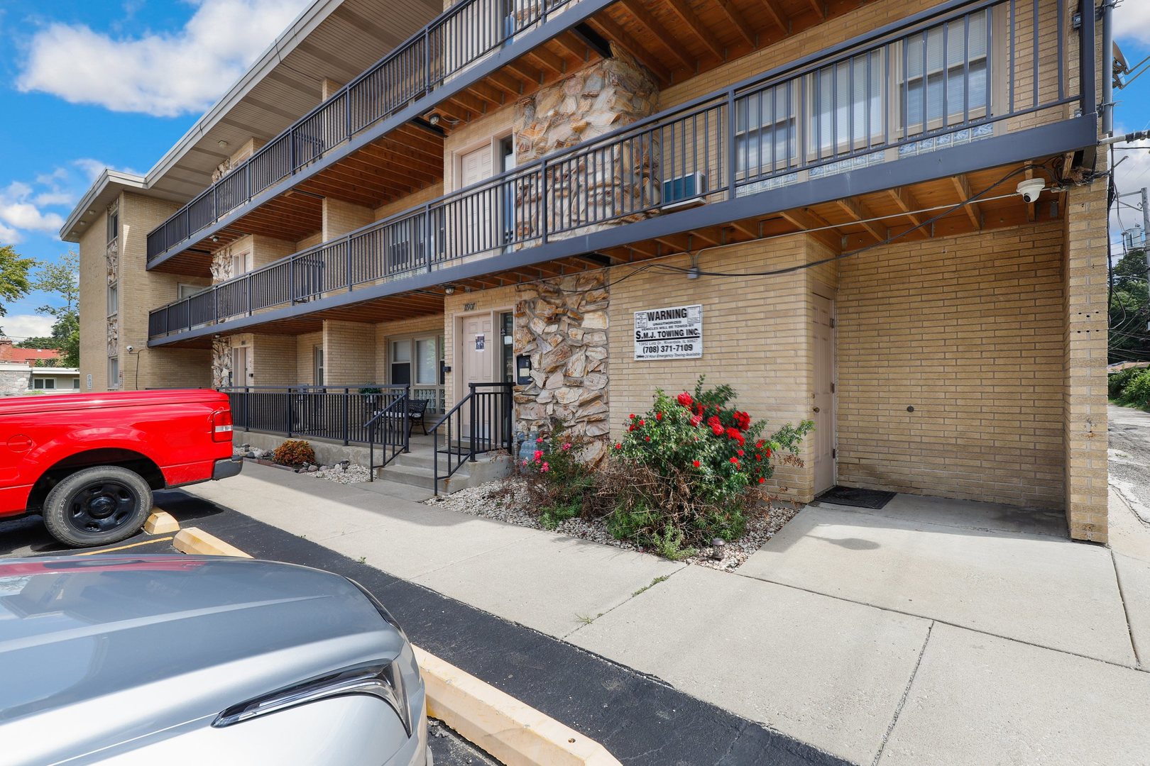11907 Gregory Street, Unit 3 Blue Island, IL 60406 - Photo 16 of 17 a view of a car park in front of building
