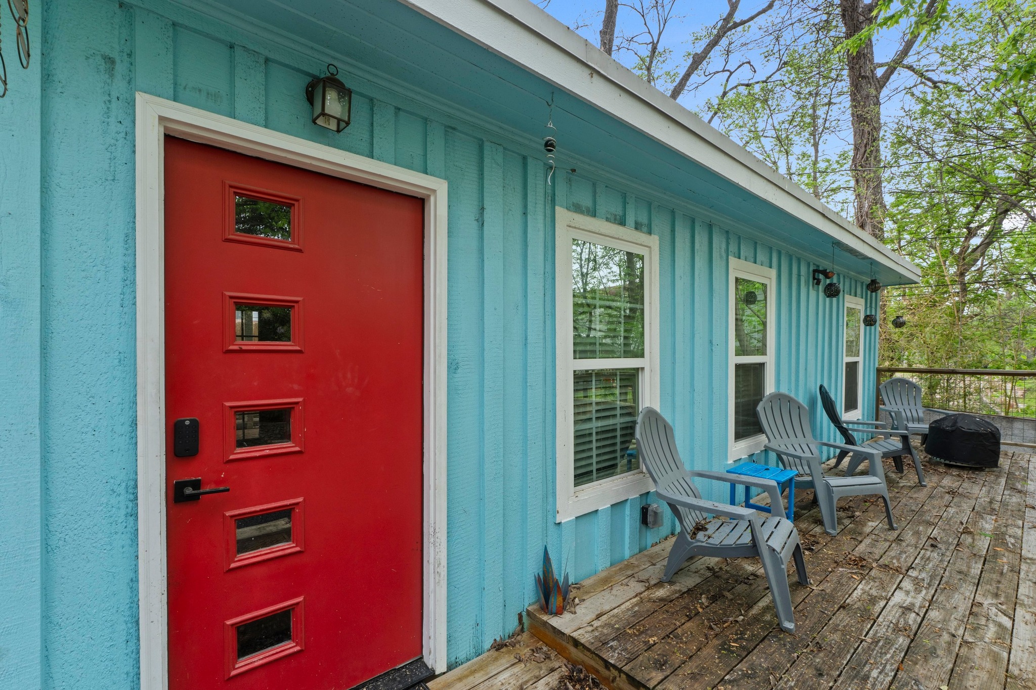 4512 Speedway, Unit A Austin, TX 78751 - Photo 1 of 39 Vibrant red entry door with multiple rectangular glass inserts