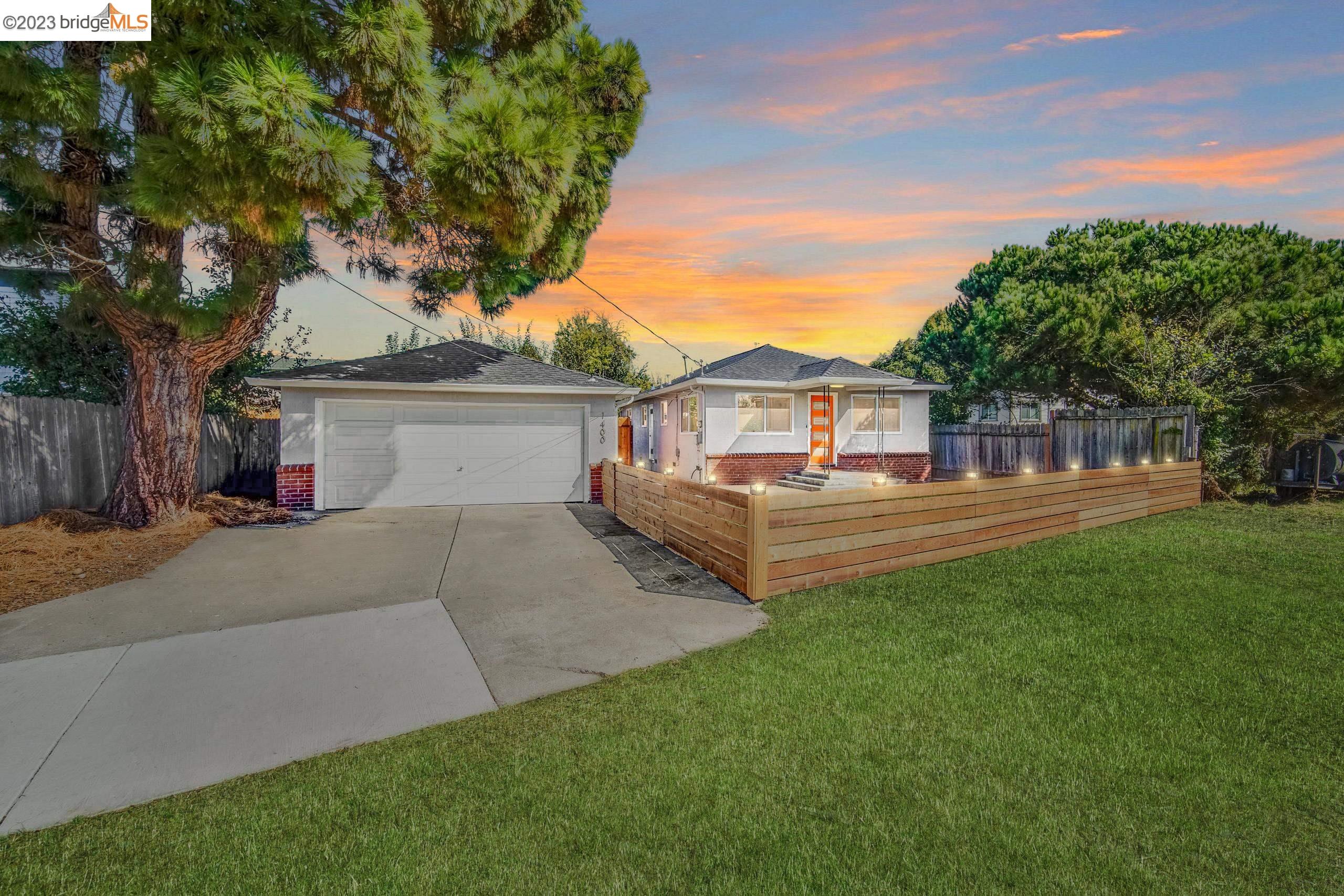 1400 Carleton Street Berkeley, CA 94702 - Photo 1 of 1 front view of a house with a yard