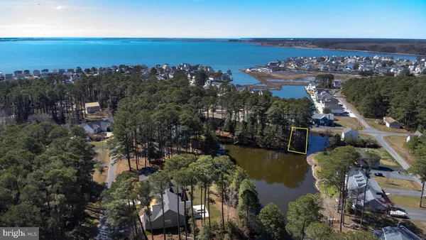 an aerial view of a house with outdoor space