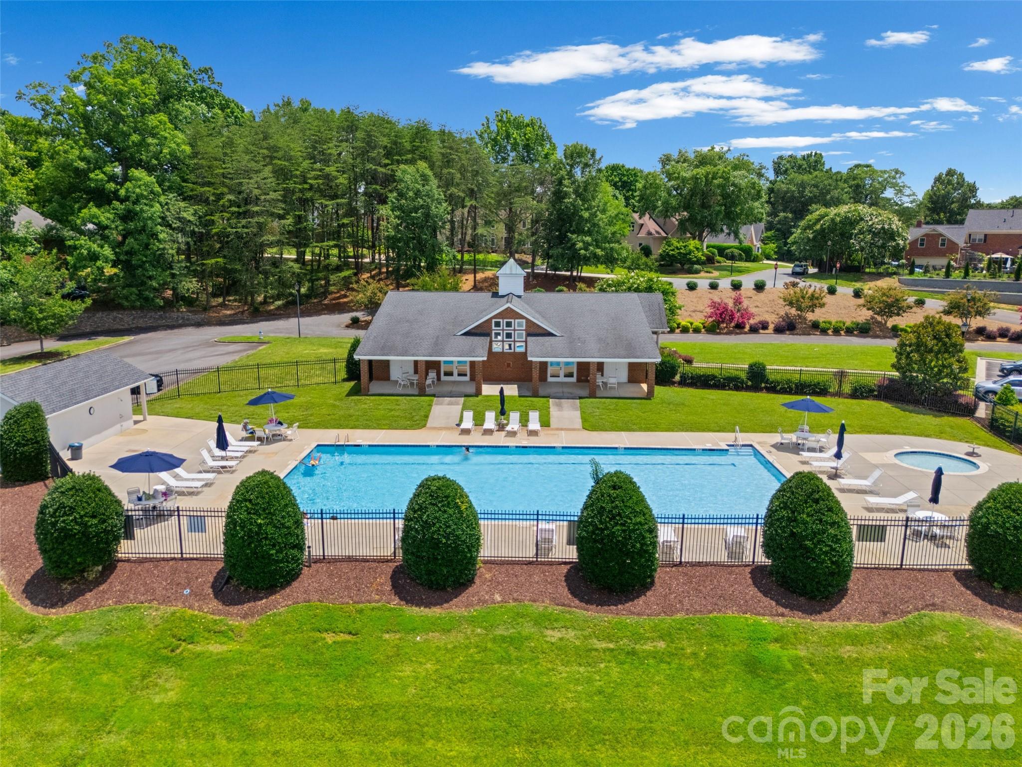 636 Landsdowne Court Fort Mill, SC 29708 - Photo 45 of 48 a swimming pool with outdoor seating and yard