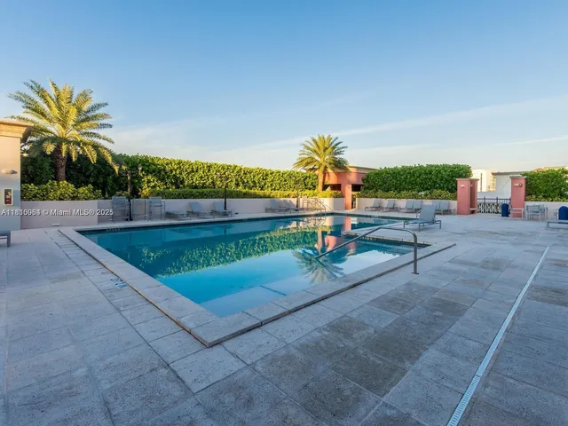 a view of a terrace with couches and potted plants
