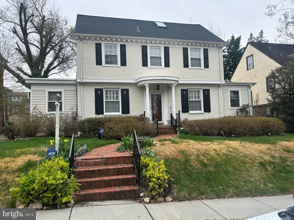 a view of a wooden deck with a yard