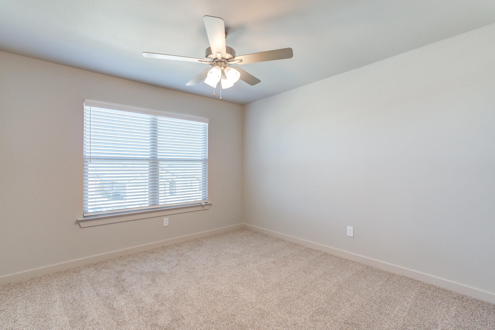 7029 25th Street Lubbock, TX 79407 - Photo 35 of 52 an empty room with a window