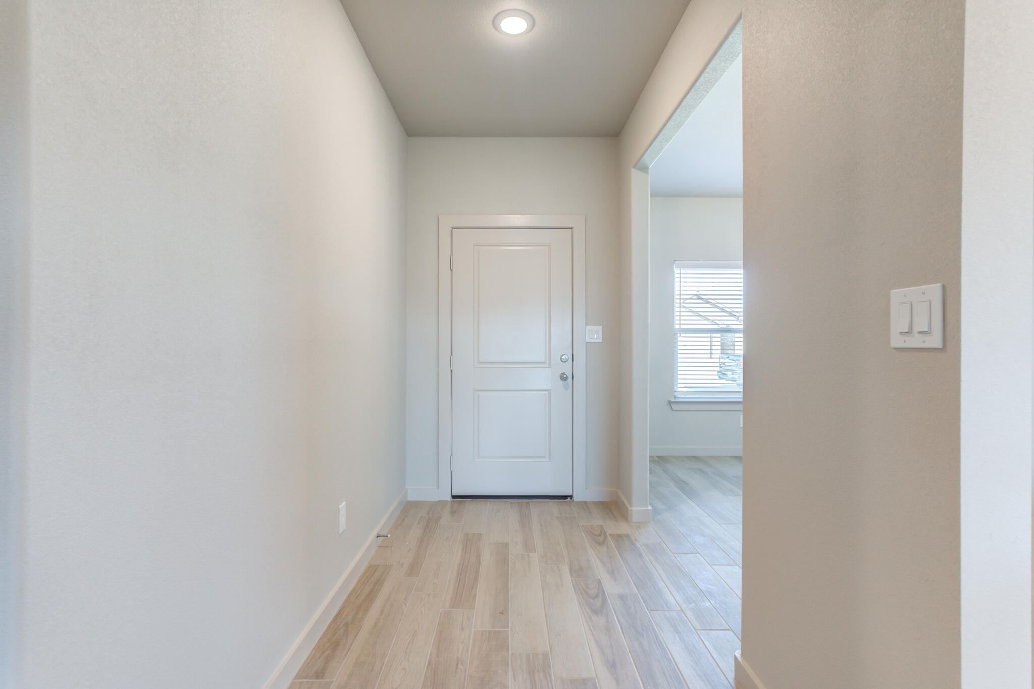 7029 25th Street Lubbock, TX 79407 - Photo 4 of 52 a view of a room with wooden floor and windows