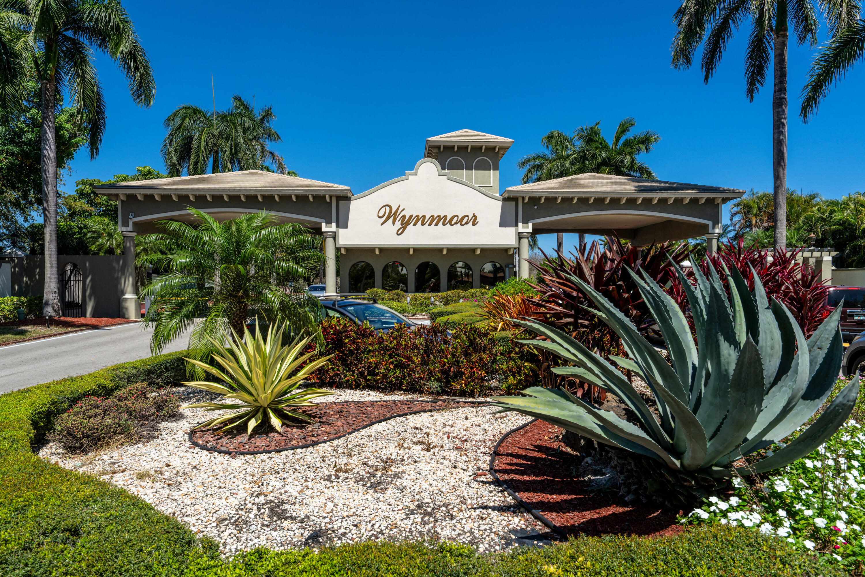 3201 Portofino Point, Unit D3 Coconut Creek, FL 33066 - Photo 22 of 34 a front view of a house with garden