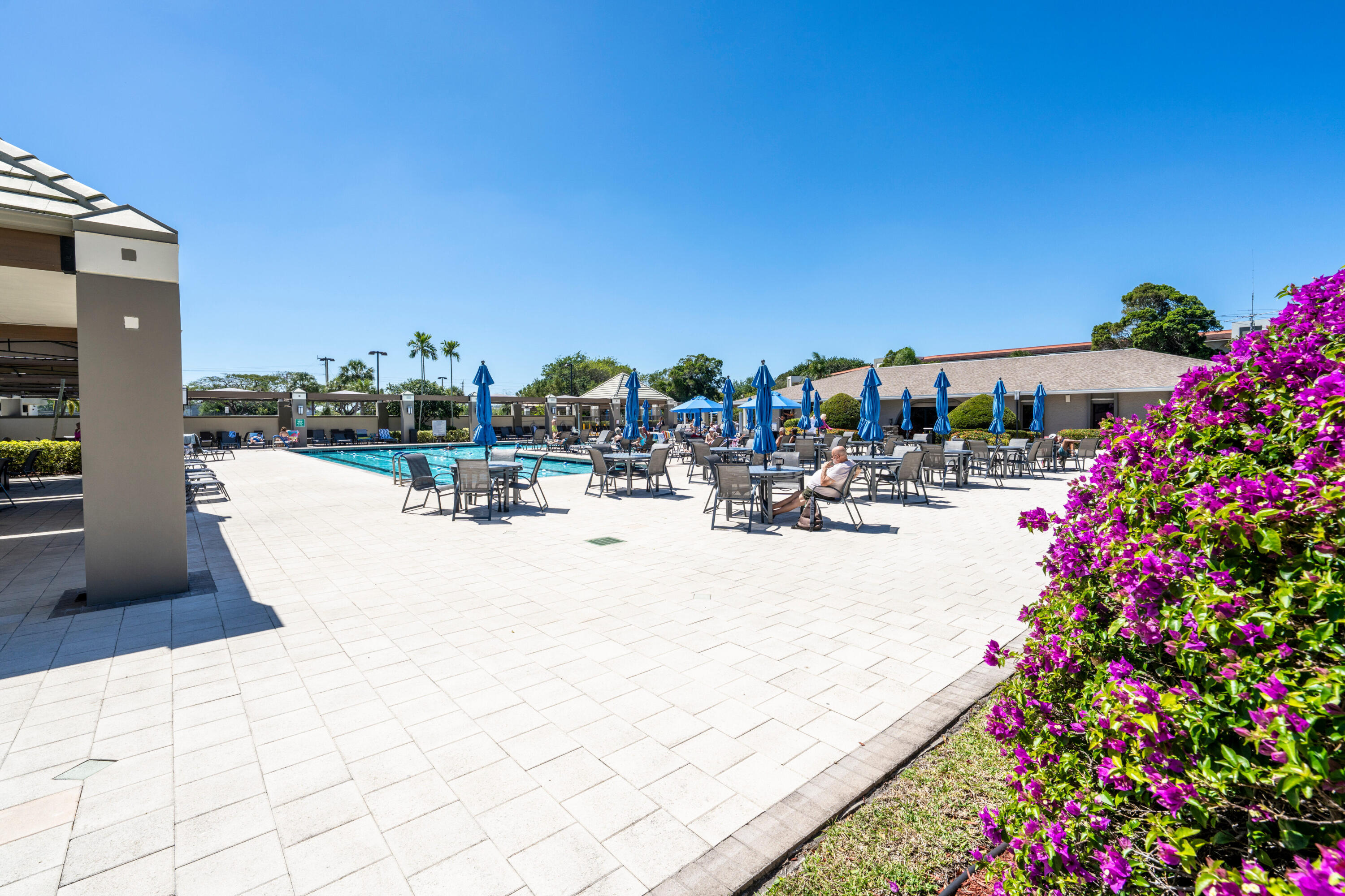 3201 Portofino Point, Unit D3 Coconut Creek, FL 33066 - Photo 26 of 34 a view of swimming pool with outdoor seating