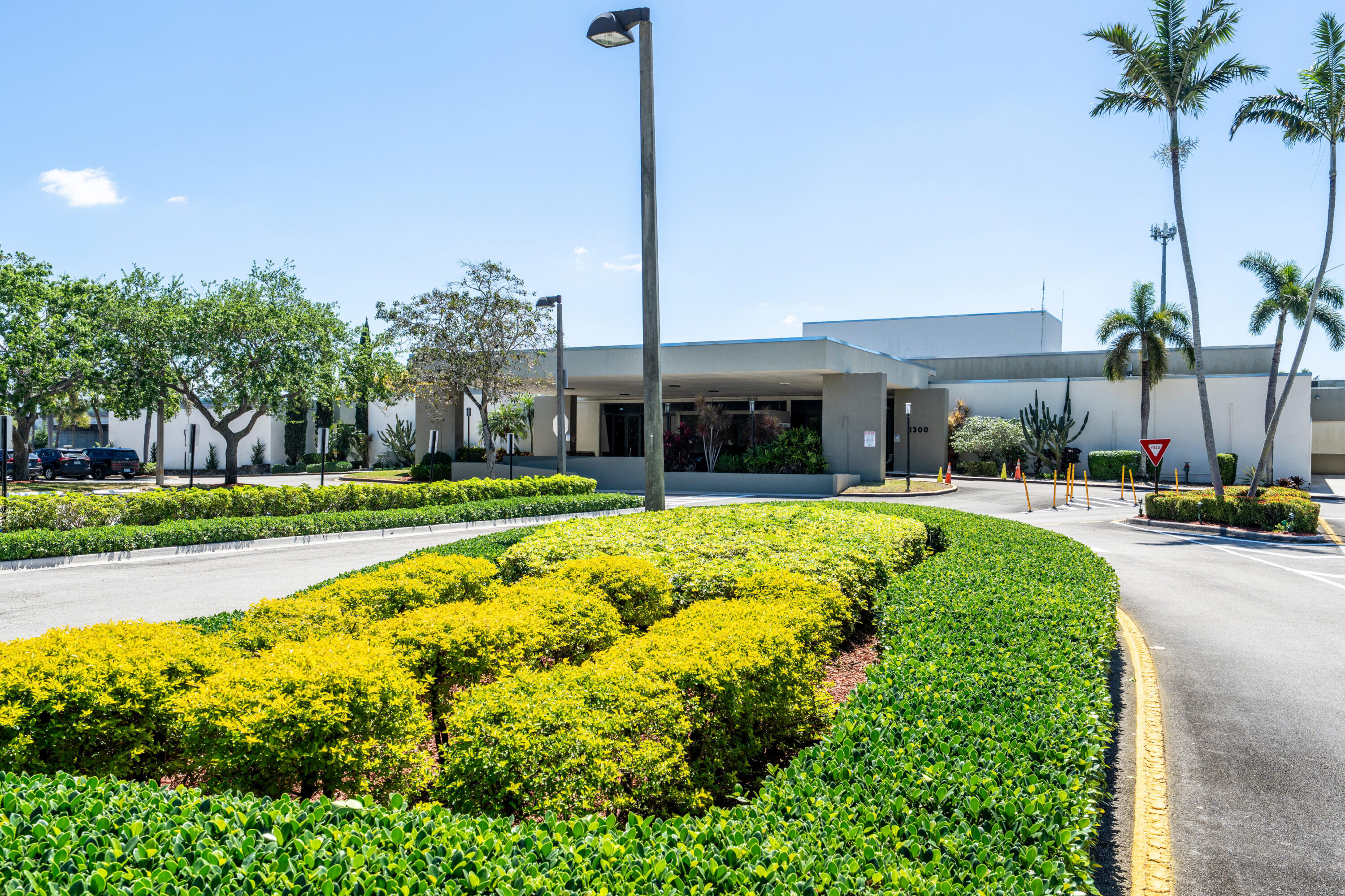 3201 Portofino Point, Unit D3 Coconut Creek, FL 33066 - Photo 32 of 34 a view of swimming pool is middle in the garden