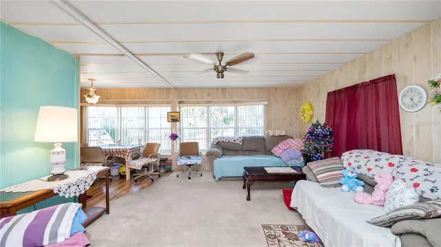 a kitchen with a sink a stove and a refrigerator
